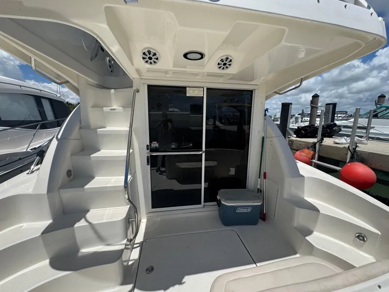 Slide: The Image of 2007 Sea Ray 360 Sedan yacht deck with stairs and sliding glass door. - 48