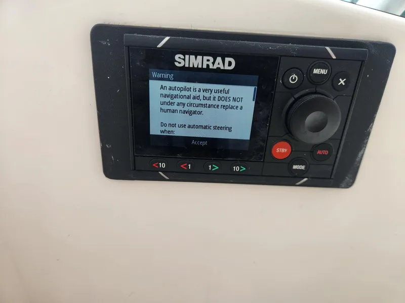 Slide: The Image of Simrad autopilot warning display on 2003 Luhrs 30 Open boat. - 15