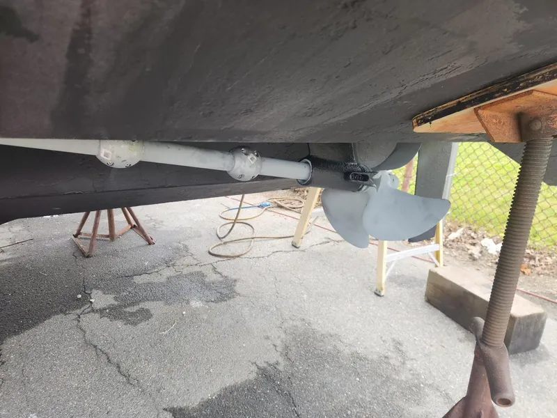 Slide: The Image of 2003 Luhrs 30 Open boat propeller and shaft on dry dock. - 8