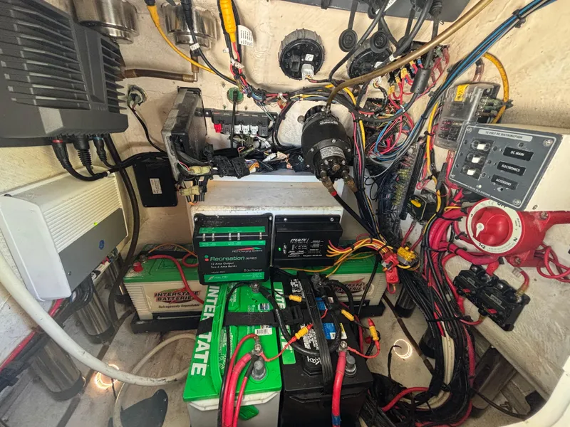 Slide: The Image of Electrical system of a 2013 SeaHunter 24 Bay boat with batteries and wiring. - 35