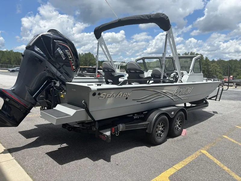 Slide: The Image of 2026 SeaArk ProCat 240 boat on trailer, featuring Yamaha outboard motor, parked outdoors. - 4