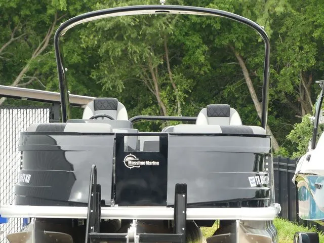 Slide: The Image of 2023 Massimo Marine LIMITED boat in front of green forest. - 15
