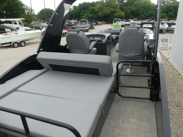 Slide: The Image of 2023 Massimo Marine LIMITED boat with gray seating outdoors. - 25