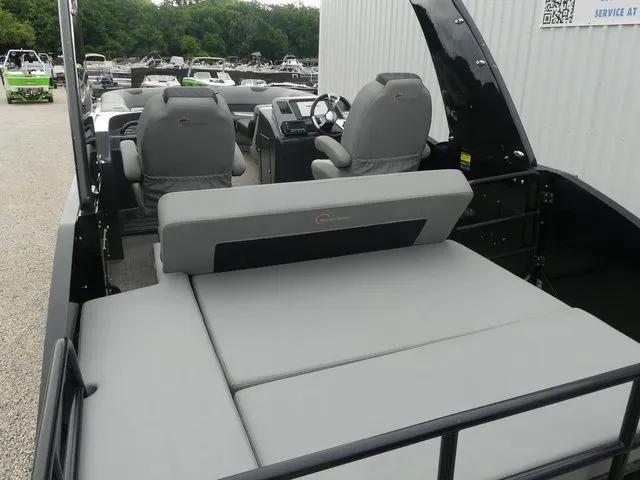 Slide: The Image of 2023 Massimo Marine LIMITED boat with gray seats and steering console. - 26