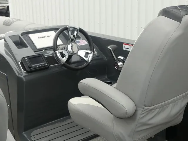 Slide: The Image of Interior of a 2023 Massimo Marine LIMITED boat with steering console. - 28