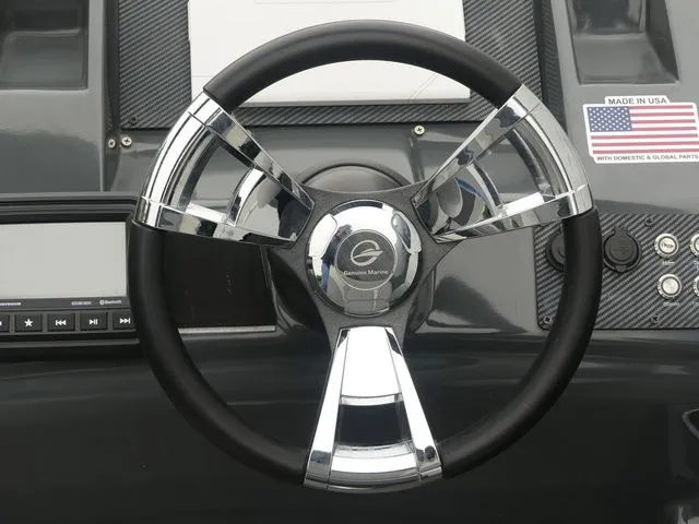 Slide: The Image of Steering wheel of a 2023 Massimo Marine LIMITED boat. - 36