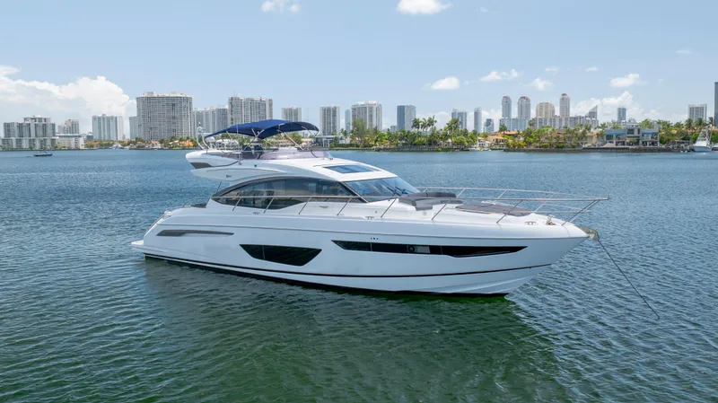 Slide: The Image of Luxurious 2017 Princess S65 yacht anchored in a scenic urban waterfront. - 0