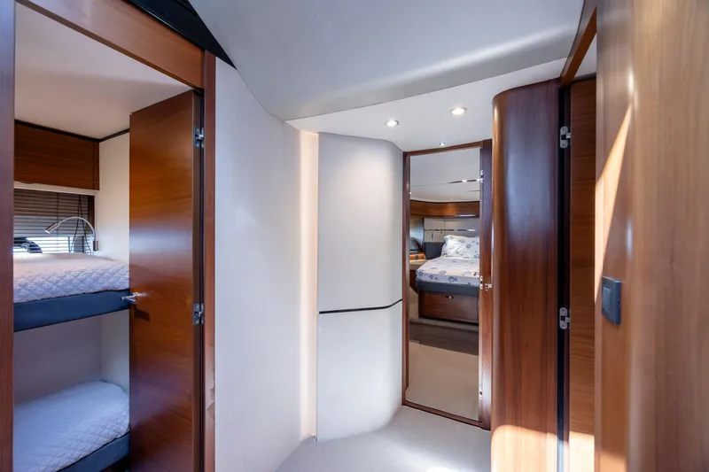 Slide: The Image of Luxurious interior of 2017 Princess S65 yacht with cozy bedrooms and elegant wood finishes. - 46
