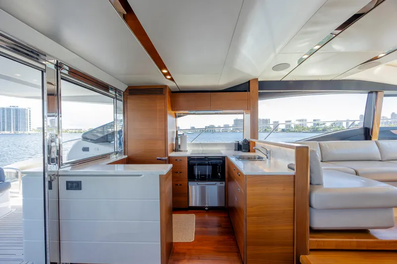 Slide: The Image of Luxurious interior of 2017 Princess S65 yacht with modern kitchen and seating area. - 48