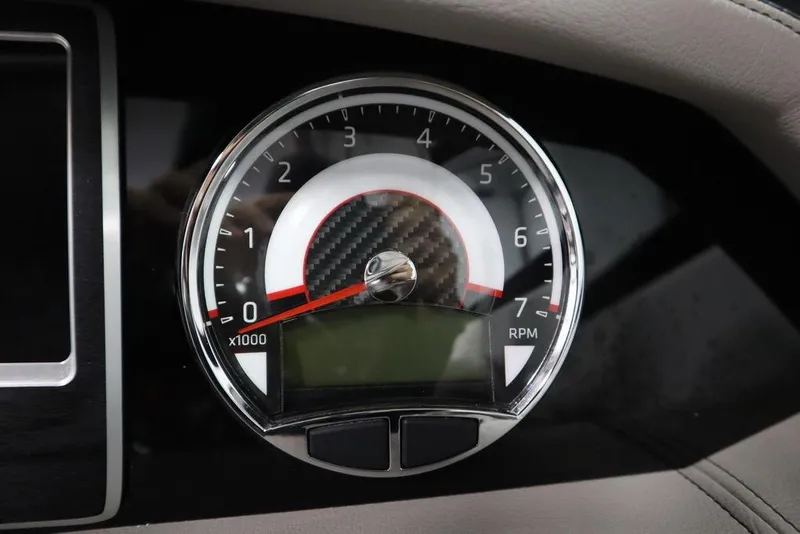 Slide: The Image of Tachometer of 2025 Four Winns HD3 boat, displaying RPM gauge. - 28