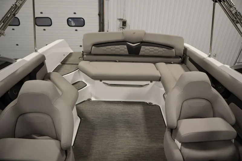 Slide: The Image of 2025 Four Winns HD3 boat interior with luxurious gray seating and modern design. - 36