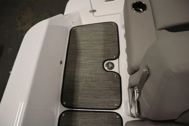 Slide: The Image of 2025 Four Winns HD3 boat interior with gray seating and textured flooring. - 39
