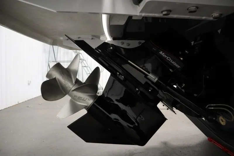 Slide: The Image of 2025 Four Winns HD3 boat with MerCruiser propeller and drive system. - 48