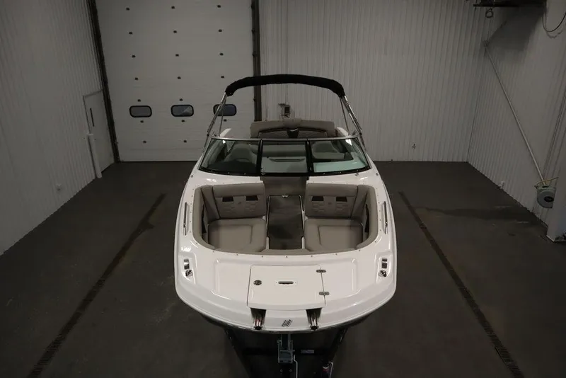Slide: The Image of 2025 Four Winns HD3 boat in indoor storage, front view. - 6