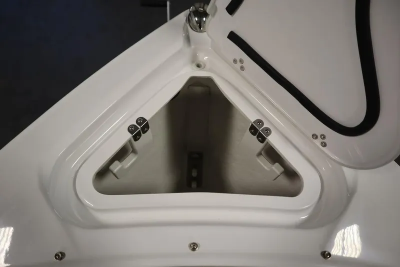 Slide: The Image of Open storage compartment on 2025 Four Winns H2 Freedom boat. - 13