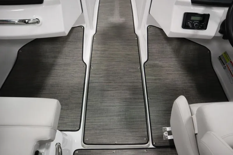 Slide: The Image of 2025 Four Winns H2 Freedom boat interior with sleek flooring and modern design. - 20