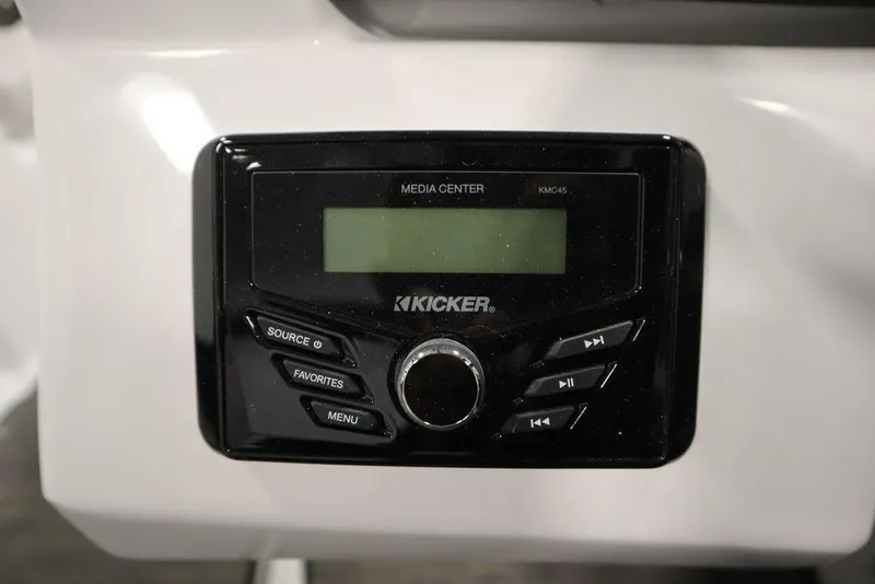 Slide: The Image of Kicker media center in 2025 Four Winns H2 Freedom boat. - 21