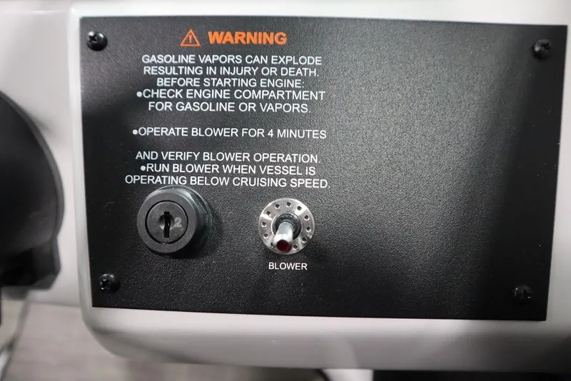 Slide: The Image of Warning label on 2025 Four Winns H2 Freedom boat, detailing gasoline vapor safety instructions. - 28