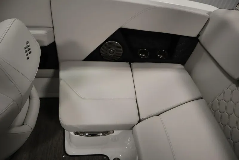 Slide: The Image of 2025 Four Winns H2 Freedom boat interior with luxurious seating and modern design. - 33