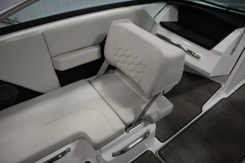 Slide: The Image of 2025 Four Winns H2 Freedom boat interior with sleek, modern seating and stylish design. - 34