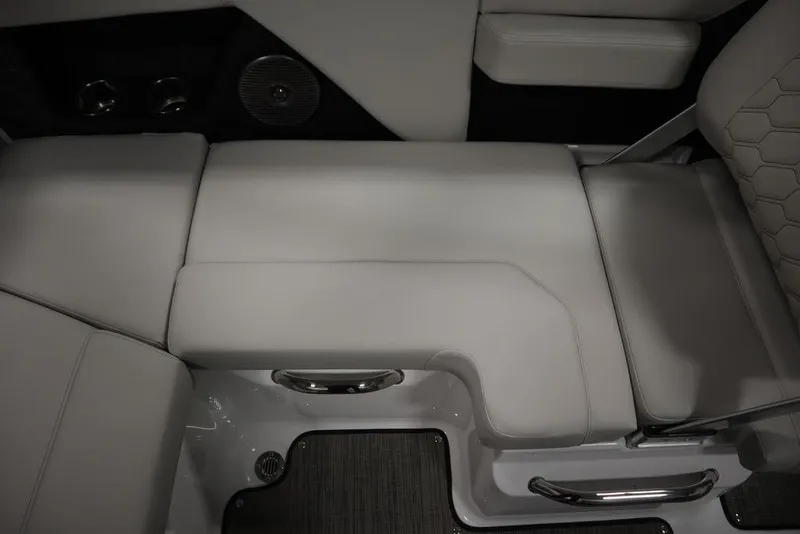 Slide: The Image of 2025 Four Winns H2 Freedom boat interior seating with modern design and comfortable upholstery. - 36