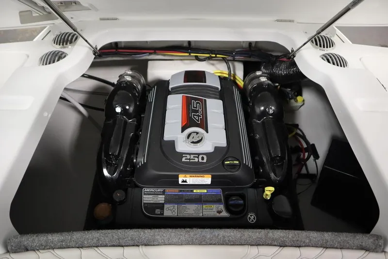 Slide: The Image of 2025 Four Winns H2 Freedom boat engine compartment with Mercury 4.5L 250 horsepower engine. - 48
