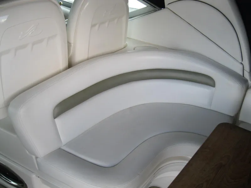 Slide: The Image of White leather seating on 2007 Sea Ray 340 Sundancer boat interior. - 14