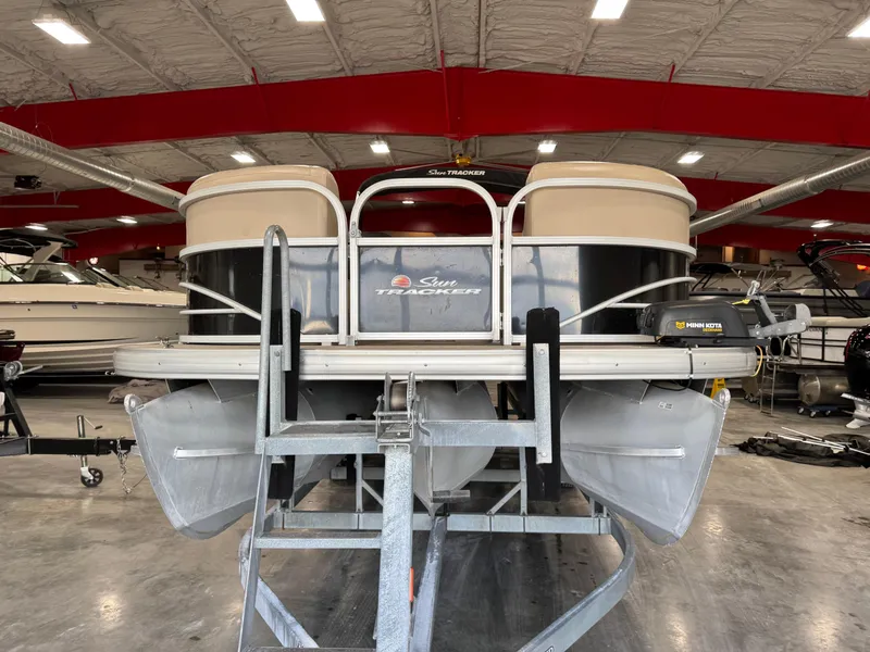Slide: The Image of 2018 Sun Tracker Party Barge 24 DLX XP3 pontoon boat in indoor storage. - 5