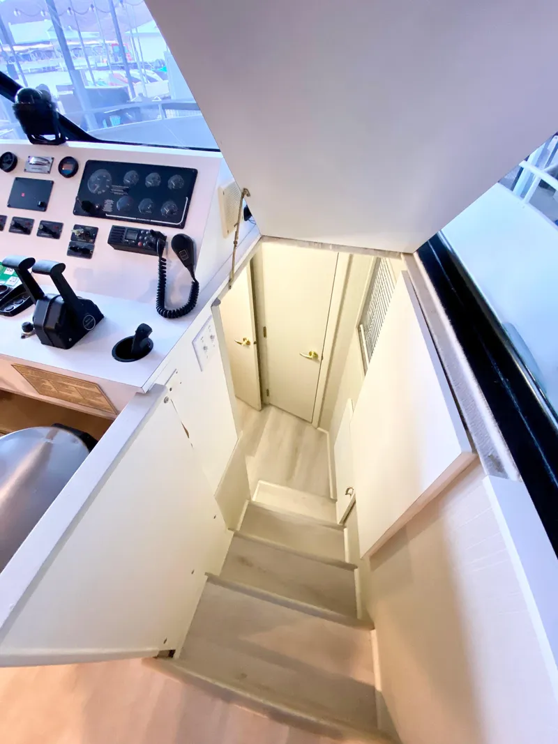 Slide: The Image of Stairway and control panel inside 1995 Skipperliner 52 Inter-Coastal Motor Yacht HB. - 15