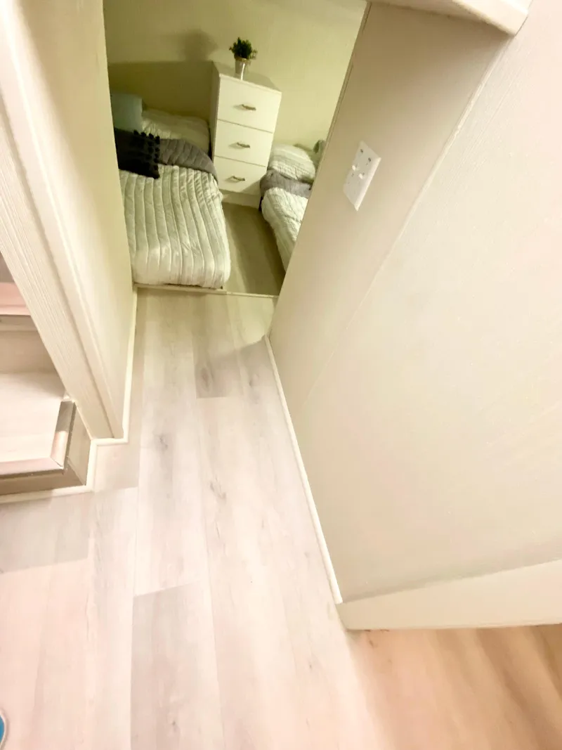 Slide: The Image of Interior of 1995 Skipperliner 52 Inter-Coastal Motor Yacht, featuring cozy sleeping area. - 17