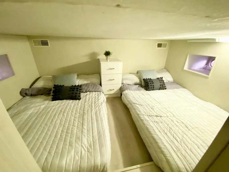 Slide: The Image of Cozy bedroom with twin beds in 1995 Skipperliner 52 Inter-Coastal Motor Yacht. - 22