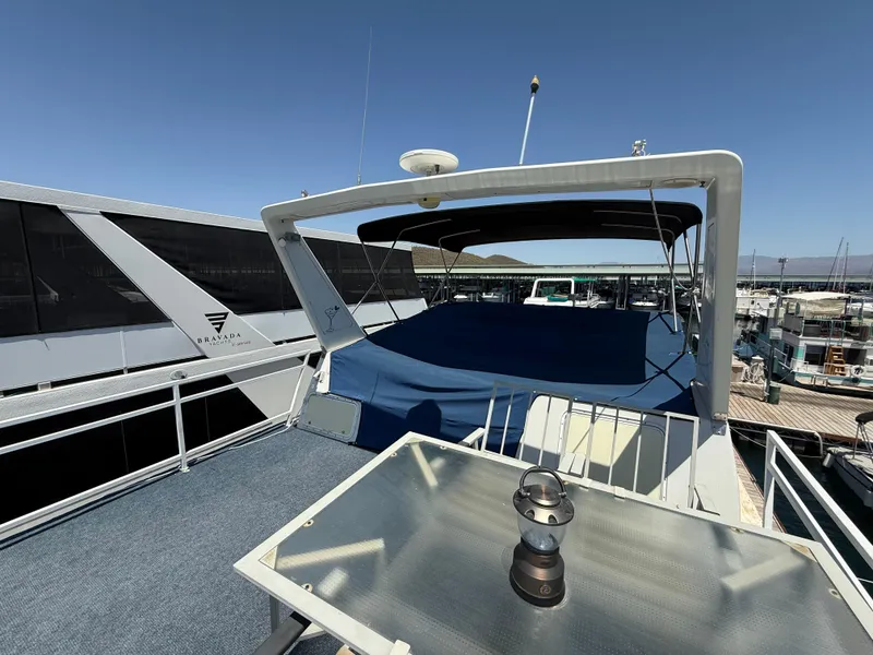 Slide: The Image of 1995 Skipperliner 52 Inter-Coastal Motor Yacht HB docked at marina, sunny day. - 25