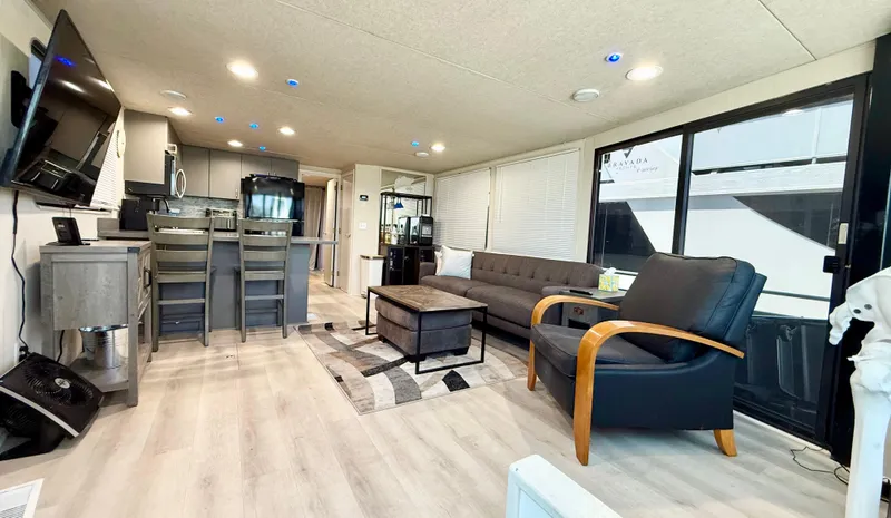 Slide: The Image of Luxurious interior of 1995 Skipperliner 52 Inter-Coastal Motor Yacht with modern furnishings. - 4