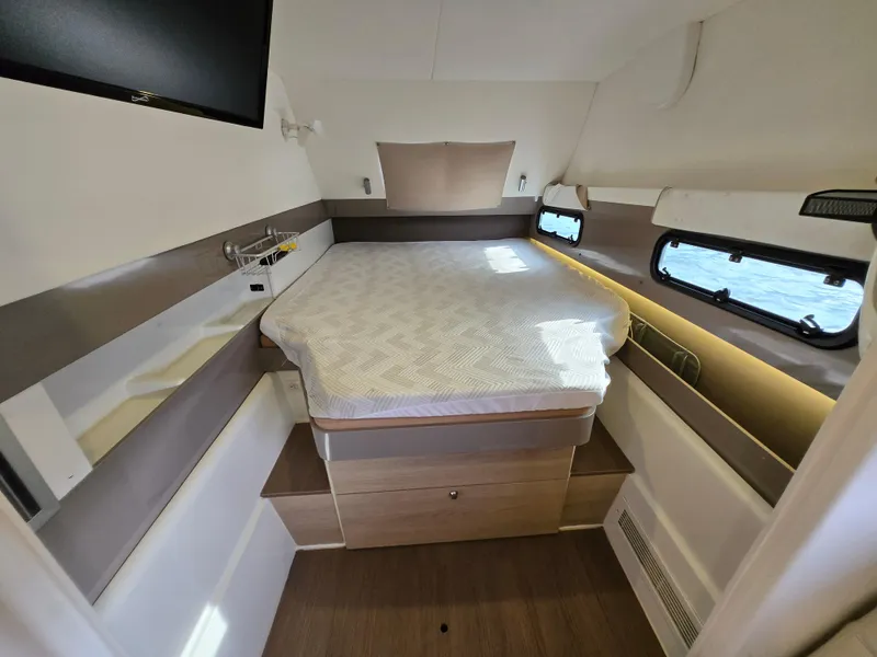 Slide: The Image of Interior cabin of 2018 Bali 4.1 Catamaran with bed and windows. - 18
