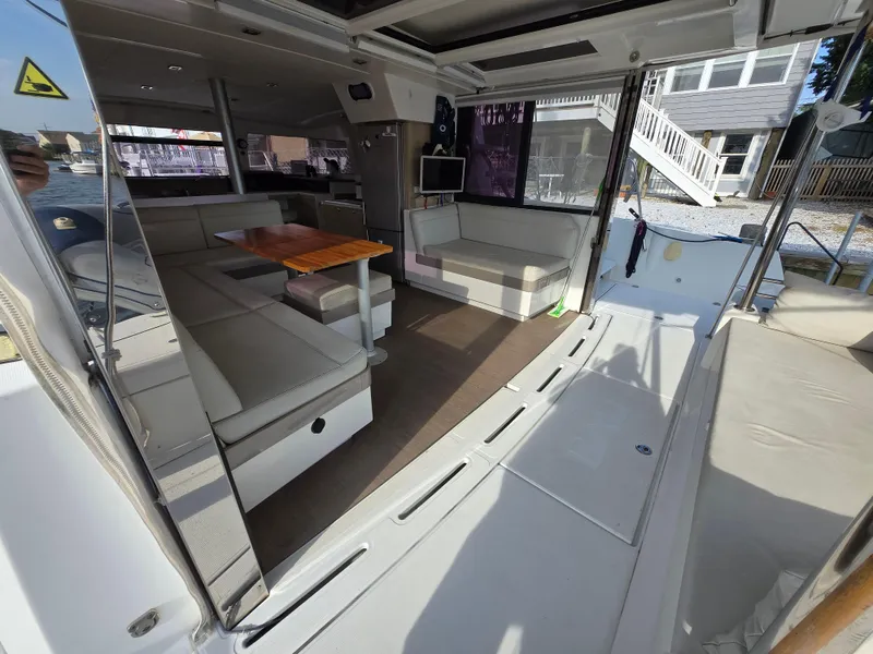 Slide: The Image of Spacious interior of 2018 Bali 4.1 Catamaran with modern seating and dining area. - 2