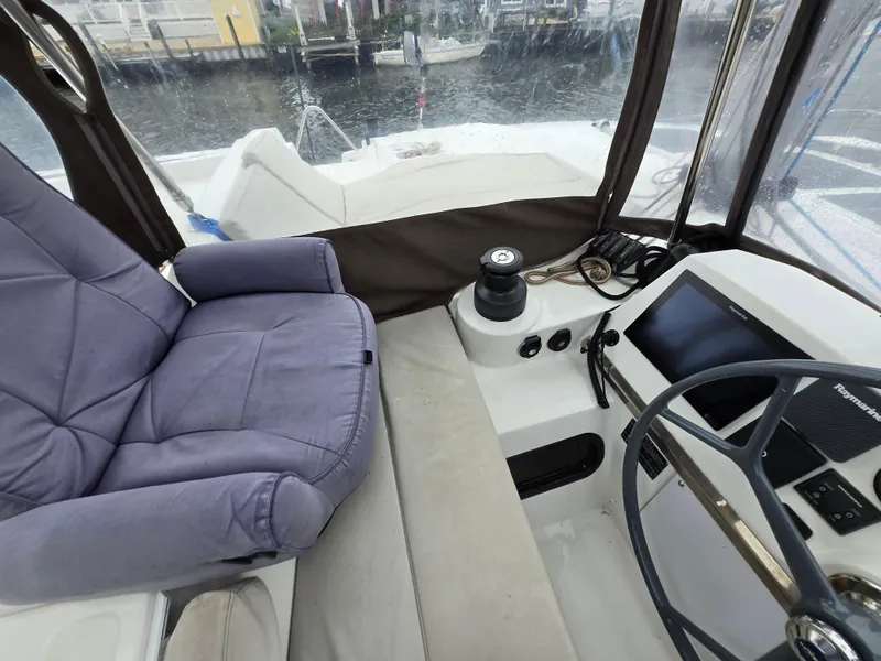 Slide: The Image of Helm of 2018 Bali 4.1 Catamaran with navigation equipment and comfortable seating. - 30