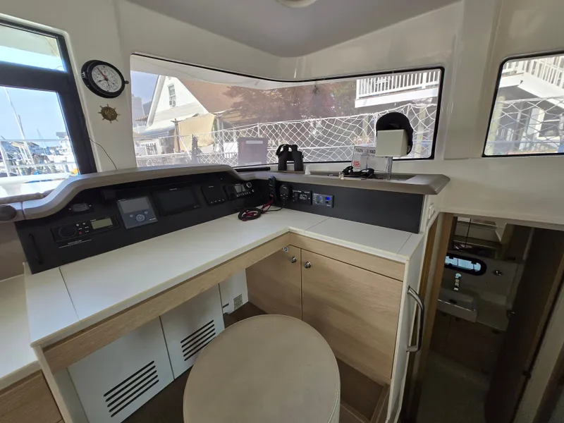 Slide: The Image of Interior helm station of a 2018 Bali 4.1 Catamaran with navigation equipment. - 47