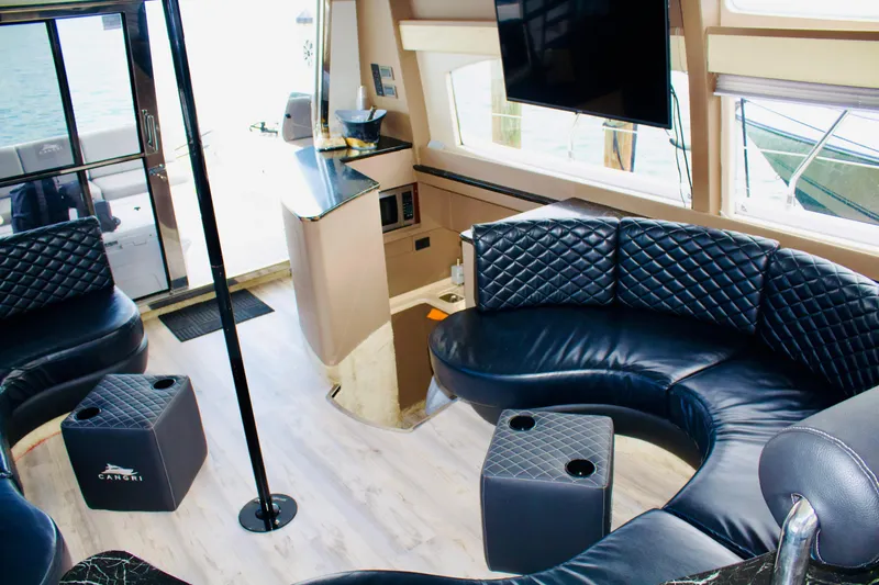 Slide: The Image of Luxurious interior of a 1997 Azimut 54 yacht with leather seating and modern decor. - 14