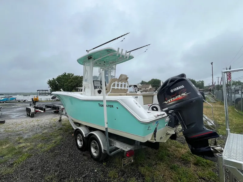 Slide: The Image of 2017 Tidewater 230 LXF boat with Yamaha engine on trailer, overcast day. - 5
