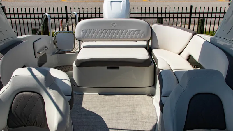 Slide: The Image of 2023 Crownline 290 XSS boat interior with luxurious seating and modern design. - 16