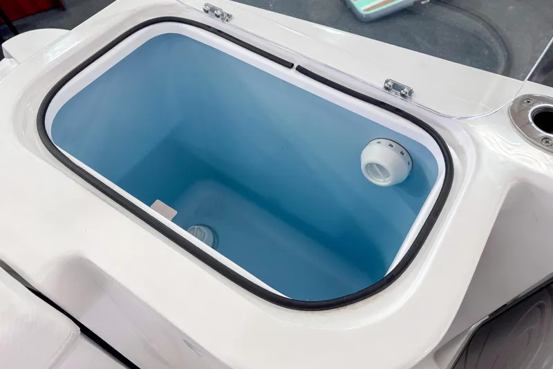 Slide: The Image of 2024 Wellcraft 263 Fisherman livewell with blue interior and secure lid. - 7