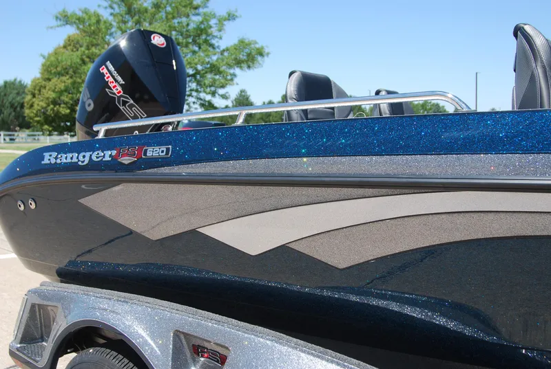 Slide: The Image of 2025 Ranger 620FS Cup Equipped boat with glittering blue finish and sleek design. - 2