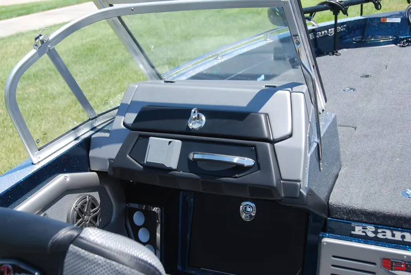 Slide: The Image of 2025 Ranger 620FS Cup Equipped boat interior with dashboard and seating. - 6
