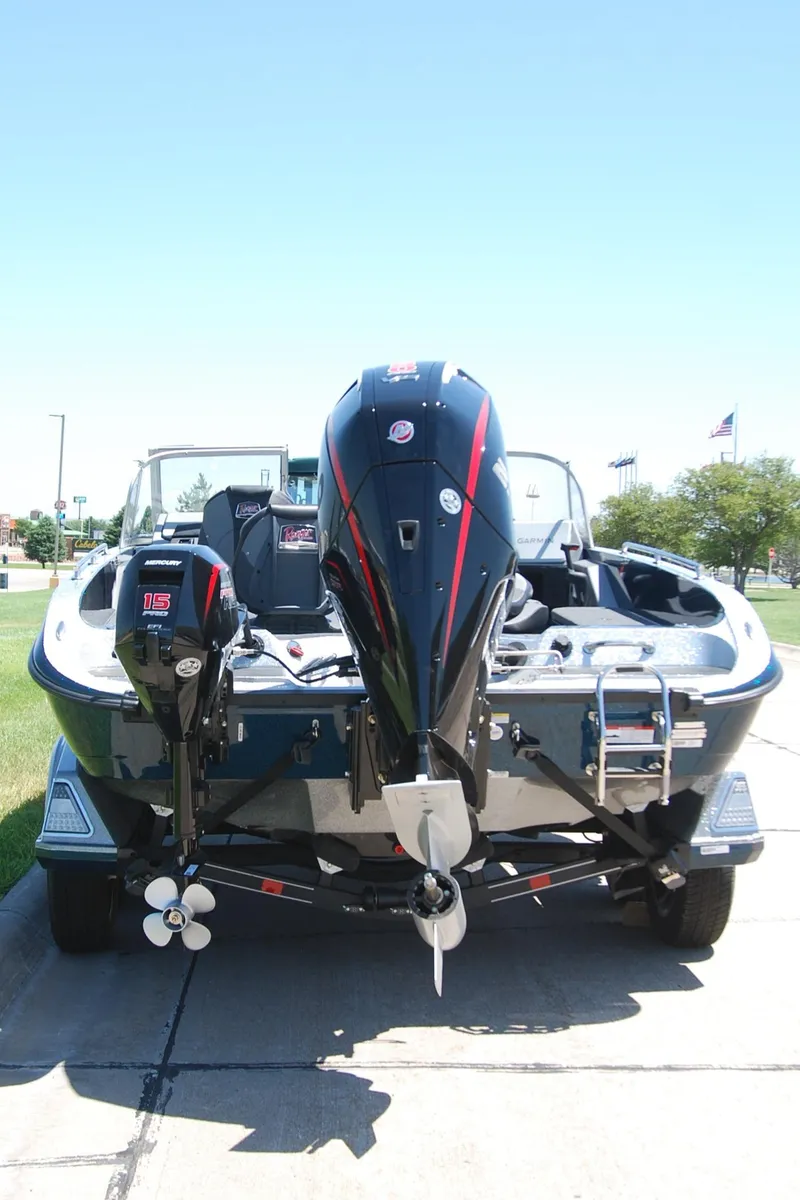 Slide: The Image of 2025 Ranger 620FS Cup Equipped boat with dual outboard motors on display. - 7