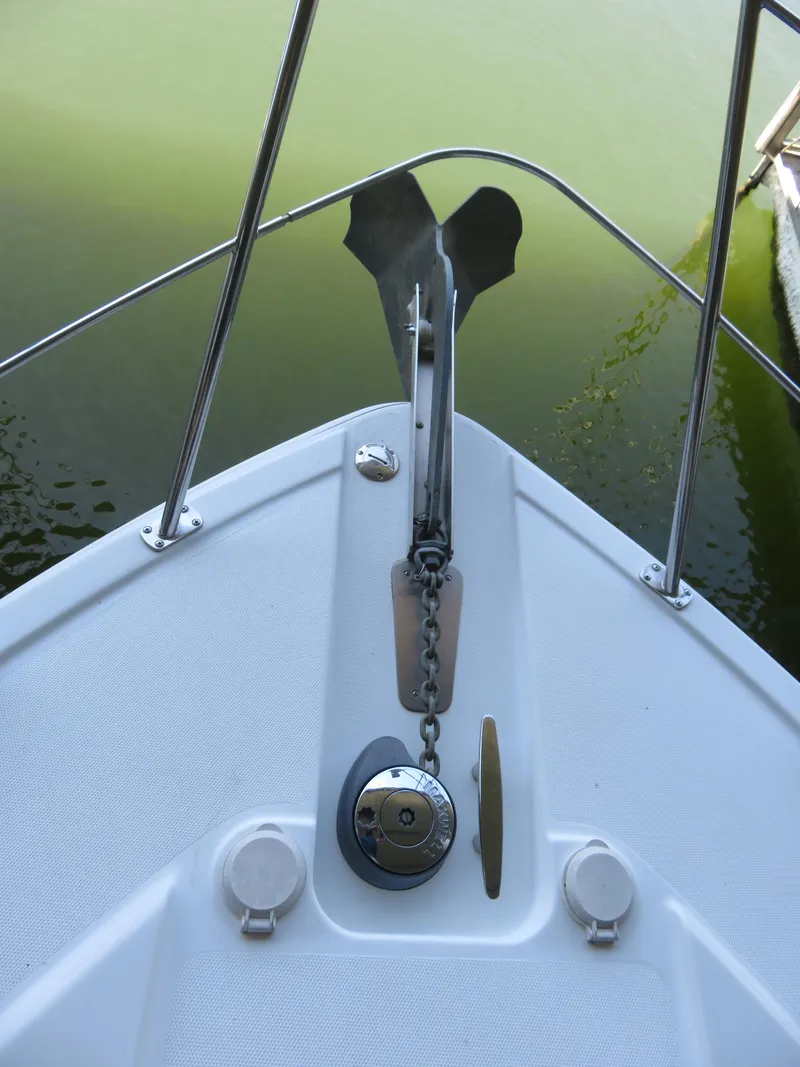 Slide: The Image of Bow of 2003 Carver 366 Motor Yacht with anchor and chain mechanism. - 7
