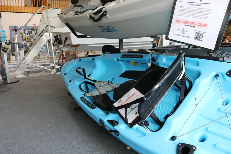 The Image of 2024 Hobie Mirage Passport 12.0 R kayak displayed at a boat show. - 0