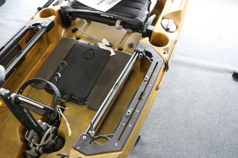 Slide: The Image of 2024 Hobie Mirage Outback kayak interior with pedal drive system and seating area. - 6