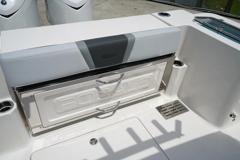 Slide: The Image of 2025 Robalo R300 Center Console boat seat with integrated storage compartment. - 9