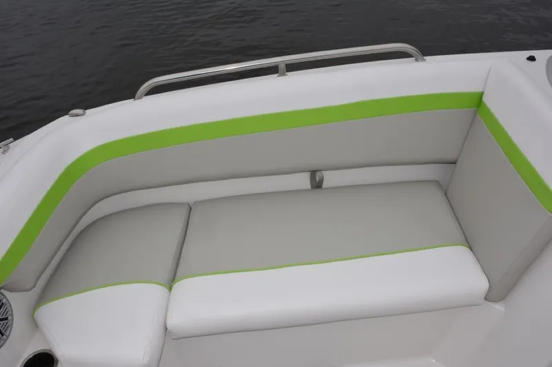 Slide: The Image of 2025 Starcraft 191 SVX boat interior with gray and green seating. - 13
