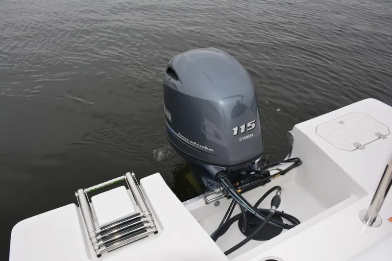 Slide: The Image of 2025 Starcraft 191 SVX boat with Yamaha 115 outboard motor on water. - 17